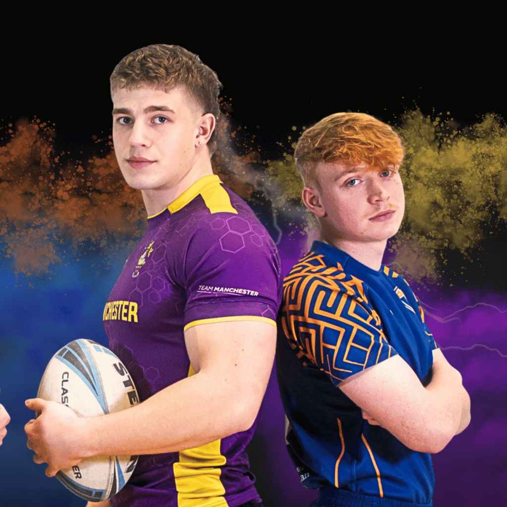 Two rugby league players posing back-to-back in playing kit.